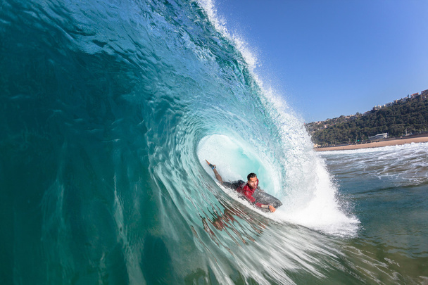 Surfing Body-Boarder Rides Blue Wave Water - Fotó, kép