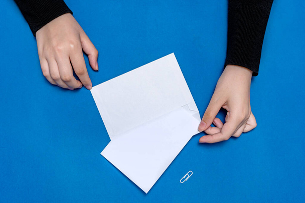 Woman Hand Holding Blank Notes Writing New Messege Updates Ideas. Lady Palm Showing Envelope Folding Sending Letters Post Address. - Photo, Image