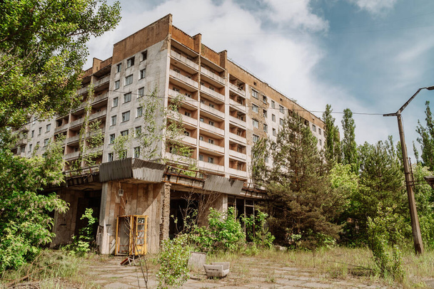 Abandoned Soviet-style apartment blocks in the city of Pripyat - 3 kilometers from Chernobyl Reactor 4 disaster - Photo, image