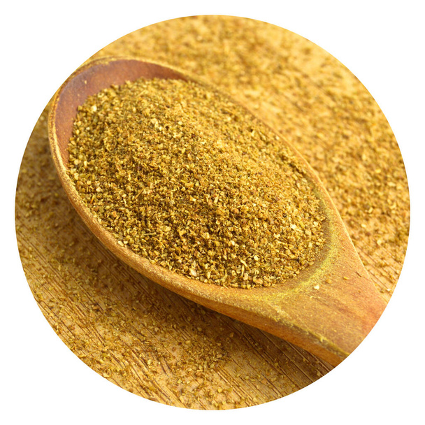Aromatic fragrant organic cumin powder spice, on bamboo cutting board in wooden spoon - Photo, Image