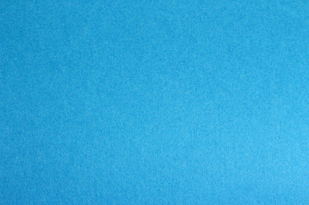 Empty copy space from blue colored sheet paper background - Fotoğraf, Görsel