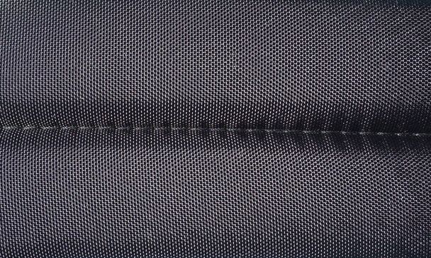 siyah polyester kumaş dokusu arka plan olarak kullanışlı - Fotoğraf, Görsel