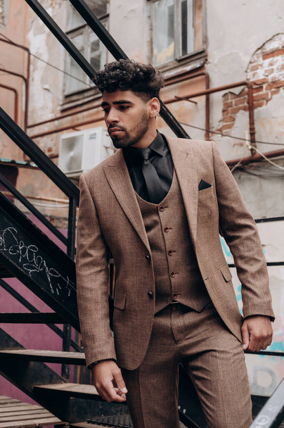 business suit on a dark-skinned man, tuxedo, three-piece suit - Фото, зображення