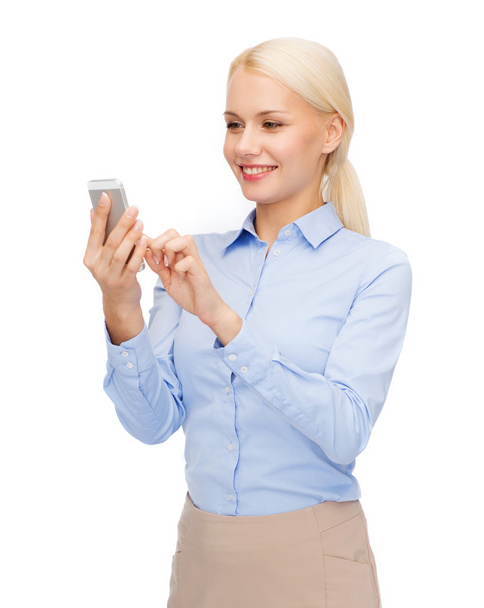 young smiling businesswoman with smartphone - Fotografie, Obrázek