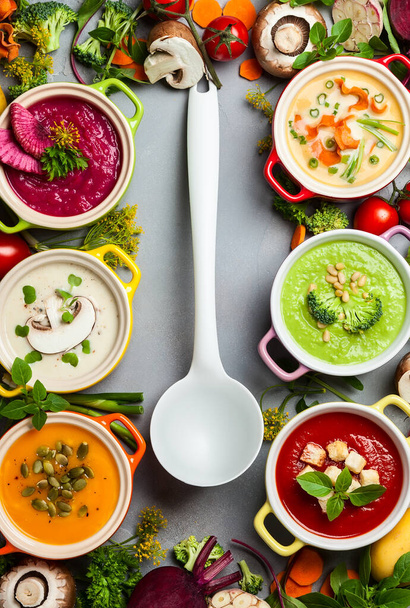 Variety of colorful vegetables cream soups and ingredients for soup. Top view. Concept of healthy eating or vegetarian food. - Foto, immagini