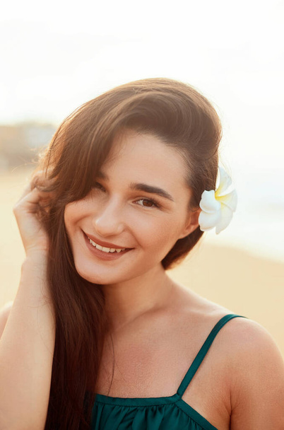 Woman with beauty face touching skin . Beautiful smiling girl model Young smiling woman  portrait. - Fotoğraf, Görsel