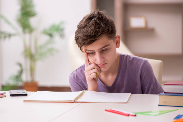 Schoolboy preparing for exams at home - Photo, Image
