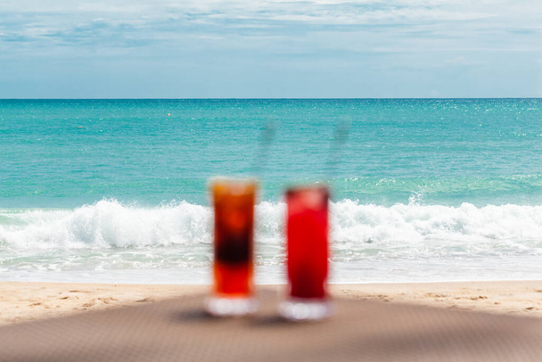 Blurred Defocused Exotic Cocktails on Table by Sea, Holidays in Paradise Concept - Fotoğraf, Görsel