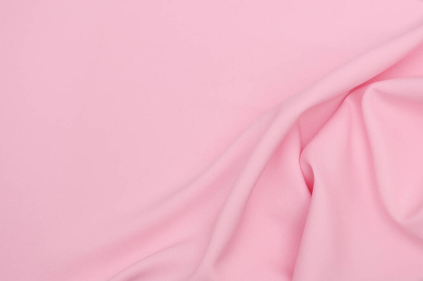 Glatte elegante rosa Gewebe abstrakten Hintergrund. Textiler Hintergrund. Stofftapete vorhanden. Grafikdesign-Element - Foto, Bild