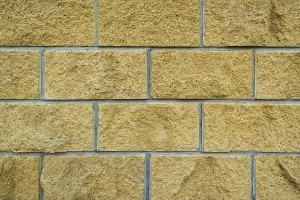 A wall of large brick for a background paint. - Foto, Bild