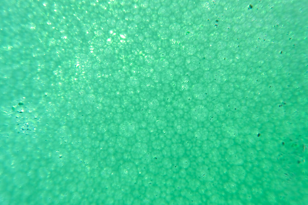 macro foto van gekleurd zeepschuim - Foto, afbeelding