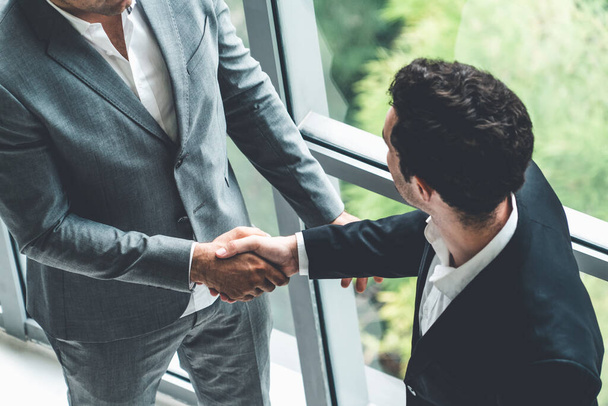 Businessmen handshake business deal in office. - Photo, Image