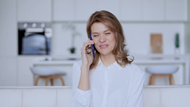 female chatting with friend by phone - Footage, Video