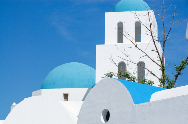 Traditional white and blue architecture of Santorini in Greece - Photo, Image
