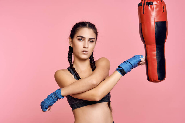 sports woman punching bag exercise punch training - 写真・画像