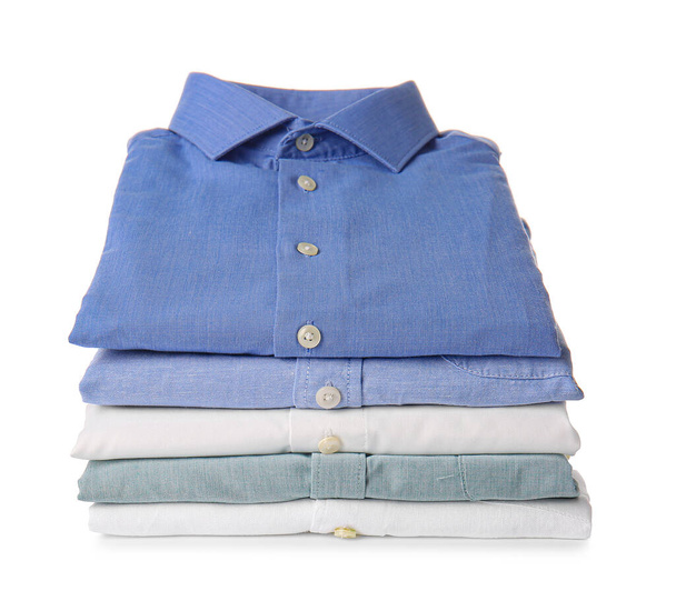 Stack of male shirts on white background - Foto, immagini