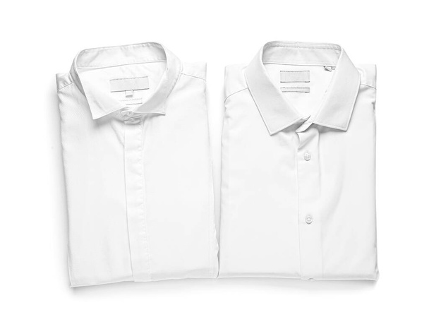 Κομψά ανδρικά πουκάμισα σε λευκό φόντο - Φωτογραφία, εικόνα