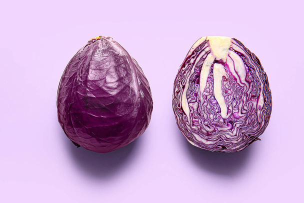 Half of fresh purple cabbage on color background - Photo, Image