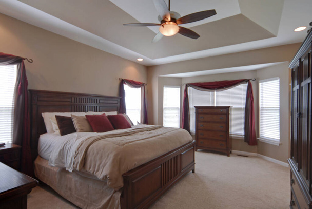 TROY, UNITED STATES - May 20, 2009: A master bedroom in a custom single-family home in Missouri - Photo, Image