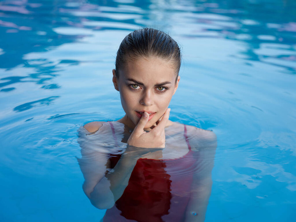 pretty woman attractive look red swimsuit pool luxury - Fotoğraf, Görsel