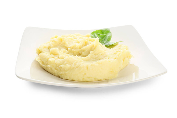 Plate with tasty mashed potatoes on white background - Foto, afbeelding