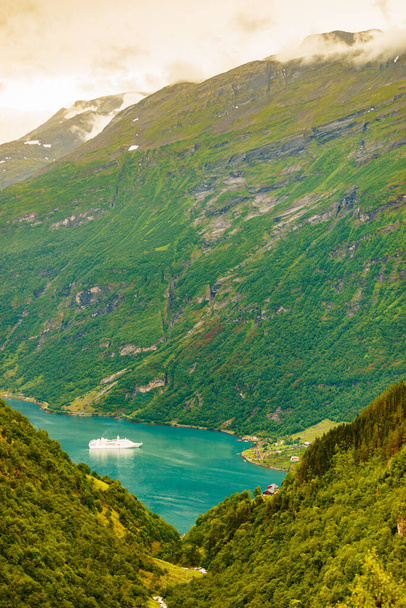 Fjord Geirangerfjord with big cruise ship, view from Ornesvingen viewing point, Norway. Travel destination - 写真・画像