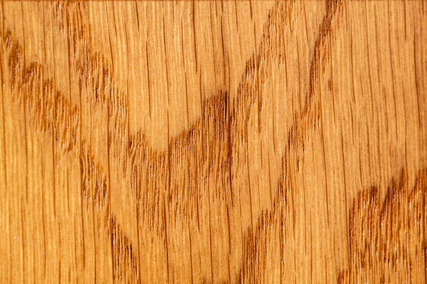 Facade surface of kitchen furniture. Close-up texture Oak Wood for Background. Light brown shade with natural pattern grain line and wave - Foto, imagen