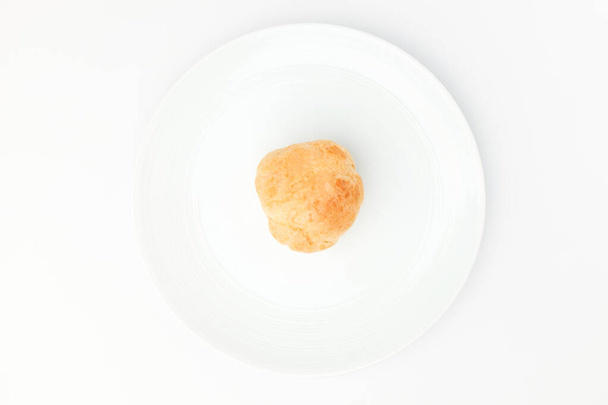 Cream puff with ice cream. Soft dessert. Bread with cookies and cream - Fotó, kép
