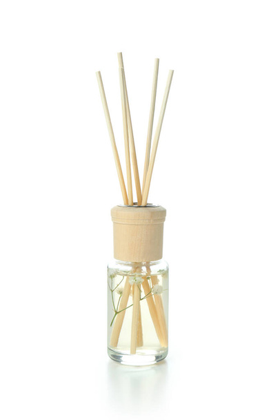 Diffuser bottle with sticks isolated on white background - Fotoğraf, Görsel