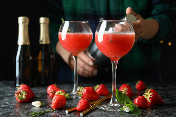 Concept of making Rossini cocktails against dark background - Photo, Image