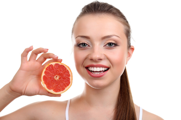 schönes Mädchen mit Grapefruit - Foto, Bild
