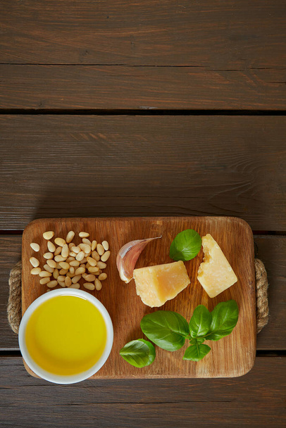 pesto ingredients on wooden surface - 写真・画像