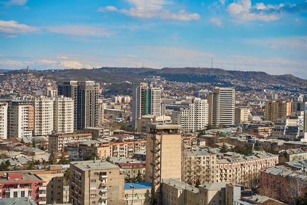 Panorama of a densely populated city. Tbilisi city landscape from above. - Photo, Image