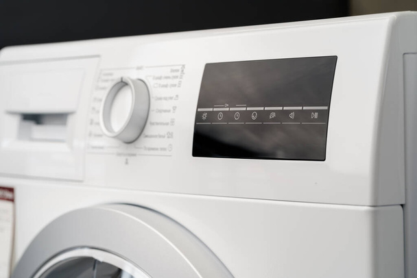 New washing machine in a home appliances store - Photo, Image