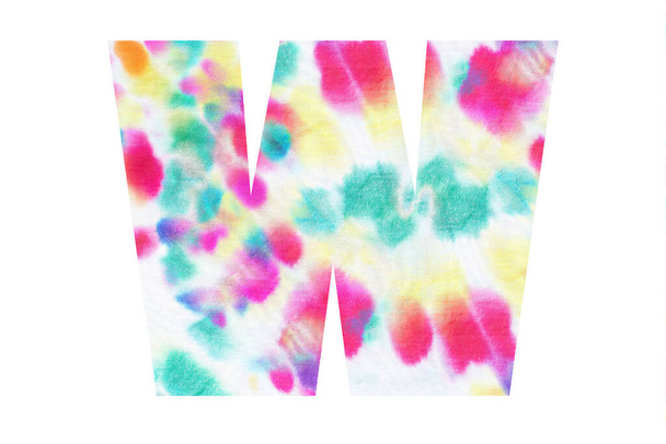 Initial letter W with abstract hand-painted tie dye texture. Isolated on white background. Illustration for headline and logo design - Photo, Image
