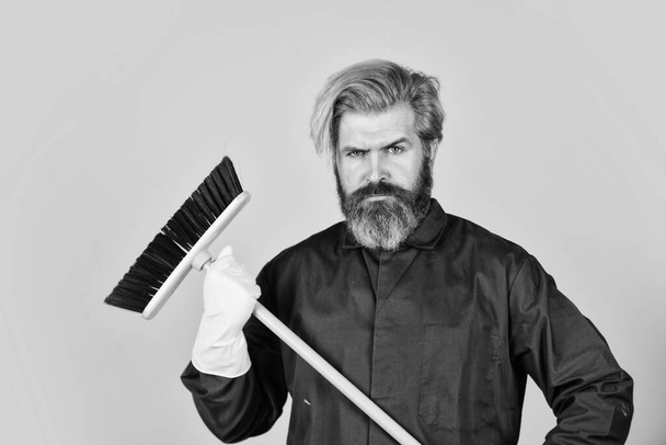 Janitor man sweeping. spring cleaning. clean service people. mature male worker with broom cleaning. Male Janitor Cleaning With Broom. Man cleaning home with broom - Photo, Image