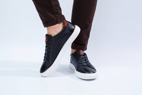Men's comfortable shoes with natural material, men's sneakers in the style of kezhual for every day made with natural leather. High quality photo - Valokuva, kuva