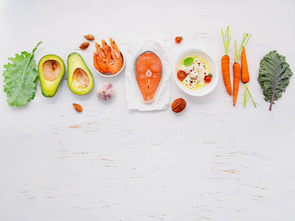 Ketogenic low carbs diet concept. Ingredients for healthy foods selection set up on white wooden background. - Foto, Imagem