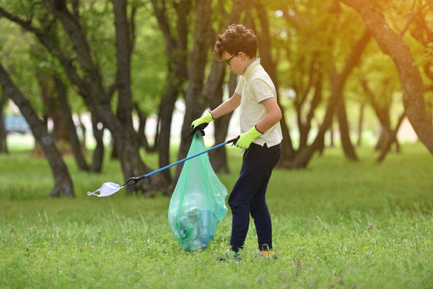 Recycle waste litter rubbish garbage trash junk clean training. Nature cleaning, volunteer ecology green concept. Young men and boys pick up spring forest at sunset. Environment plastic pollution - Φωτογραφία, εικόνα