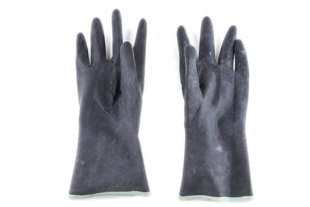 pair of black rubber protective gloves coated against acids and alkalis, isolated on white, front view, parallel arrangement - Photo, Image