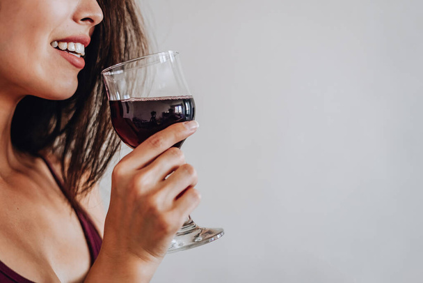 asian woman drinking wine at home.selective focus - Photo, Image