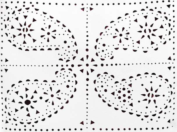 perforated paisley pattern on white leather - Photo, Image