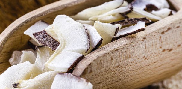 makro detail kulinářské složky, strouhaného kokosu, kousku kokosu nebo čipu - Fotografie, Obrázek