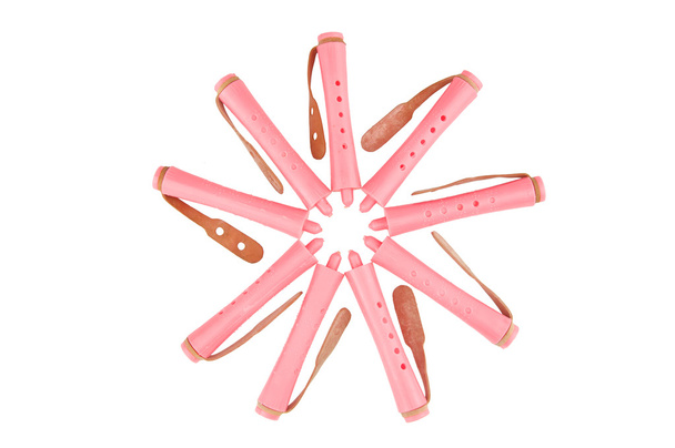 Pink plastic curler put as flower isolated - Photo, Image