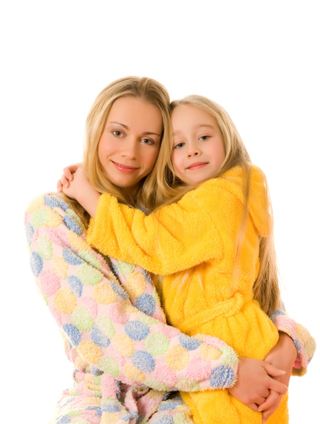 Madre e sua figlia in accappatoi colorati
 - Foto, immagini