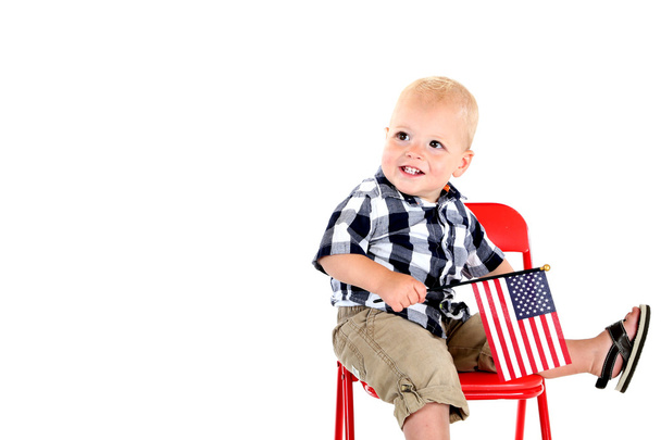 One year old boy holding an American flag sitting - Photo, Image