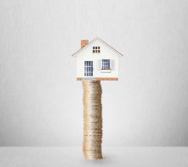 Mortgage concept by money house from  coins  - Photo, Image