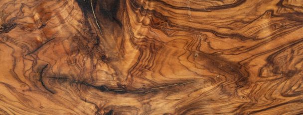 ダークブラウンのオリーブの木板の質感。木の表面の背景 - 写真・画像