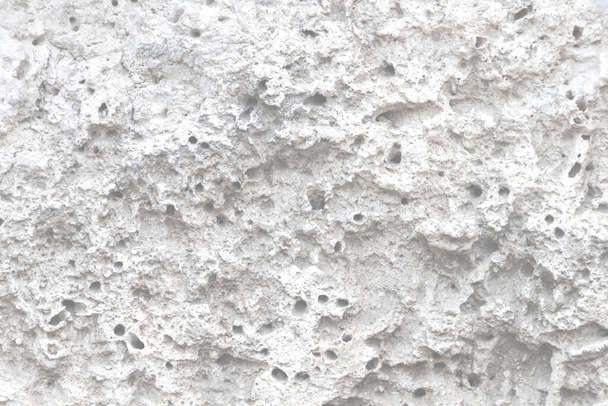 La superficie de piedra labrada áspera y desigual. Losa de piedra áspera sin pulir. - Foto, imagen