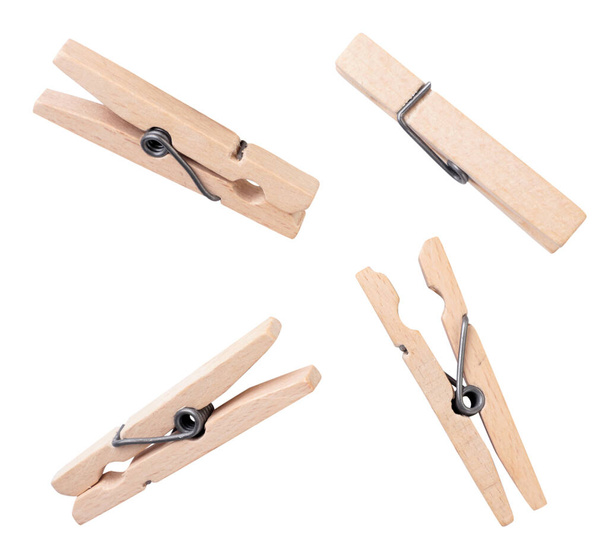 Set of wooden clothespins close-up on a white background. Isolated - Photo, Image
